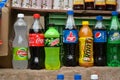 New Delhi, India, 2020. Cold drink brands kept for display at a roadside vendor shop during summers. Soft drink sales go up during