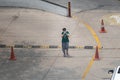 New Delhi, Delhi, India - 05/05/2020: A fearful woman wearing face cloth as mask and glasses walking on deserted streets alone Royalty Free Stock Photo