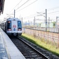 New Delhi, India, February 17 2024 - Delhi Metro train arriving at Jhandewalan metro station in New Delhi, India, Asia, Public