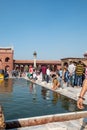 people evisitimng Jama Masjid in New Delhi, the most importand mosque in India Royalty Free Stock Photo