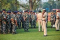 Indian police and military detachment await orders from higher authorities as military units