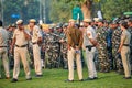 Indian police and military detachment await orders from higher authorities as military units