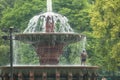 Man Taking A Shower In The Fountain.