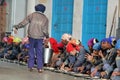 NEW DELHI, INDIA - March 21, 2019 : pilgrims eat free meals in the golden temple Gurudwara Bangla Sahib in Delhi