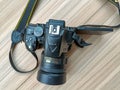 New Delhi, India, May 28 2023 - Nikon D5300 camera with 35mm f2.8 prime lens on plain background, Nikon DSLR camera shoot