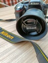 New Delhi, India, May 28 2023 - Nikon D5300 camera with 35mm f2.8 prime lens on plain background, Nikon DSLR camera shoot