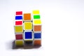 New Delhi, India - May 10, 2019. Rubik`s cube color blue, white, orange, green, yellow on white background with space for text