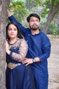 New Delhi India Ã¢â¬â November 25 2019 : A couple pose for Pre Wedding shoot inside Lodhi Garden Delhi, a popular tourist landmark Royalty Free Stock Photo