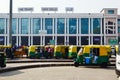 Parking lot with tuk tuks in front of New Delhi railway station Royalty Free Stock Photo