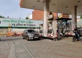 New Delhi, India, 2020. Petrol / Diesel being filled into a car at an Indian Oil Petrol Pump to get tank full and pollution