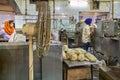 Volunteers preparing free food for visitors in the Gurdwara community kitchen Langar hall of Sri Bangla Sahib Gurudwara Sikh tem