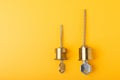 New door lock on a yellow background. Patent and keys from the front door. Royalty Free Stock Photo