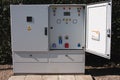 New electrical cabinet with open doors with electrical equipment