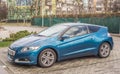 New elegant blue Honda CR-Z sports hybrid coupe parked