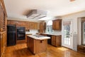 New empty minimalist house kitchen interior with wooden furniture in Kansas City, Missouri, USA Royalty Free Stock Photo
