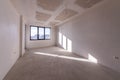 New empty room under construction. Plaster walls. New home. Concrete walls. Interior renovation Royalty Free Stock Photo