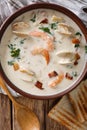 New England chowder soup close-up. Vertical top view