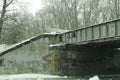 old train bridge covered in snow, New England Winter scene Royalty Free Stock Photo