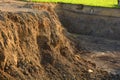 New excavated excavation pit with groundwater at sunrise, excava