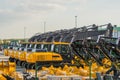 New Excavators are lined up in a parking lot Royalty Free Stock Photo