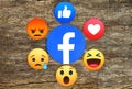 New Facebook like button 6 Empathetic Emoji Reactions on wooden background Royalty Free Stock Photo
