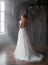 New fairy tale about Cinderella, sweet and gentle lady in amazing wonderful white long dress with open back and straps