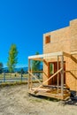 New family townhouse under construction on blue sky background. Royalty Free Stock Photo