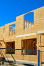 New family townhouse under construction on blue sky background. Royalty Free Stock Photo