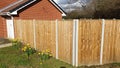 New fence with concrete posts larch lap Royalty Free Stock Photo