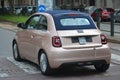 New FIAT 500 full  electric caught up in the city streets for drive test Royalty Free Stock Photo