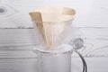 New filter for subsequent alternative brewing of coffee in the funnel v60 Royalty Free Stock Photo