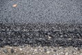 New fresh asphalt. edge of new road from the asphalt Royalty Free Stock Photo