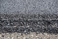 New fresh asphalt. edge of new road from the asphalt Royalty Free Stock Photo