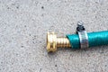 new garden hose replacement connection and pipe mender to tighten and secure repair.