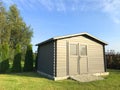 New garden house or shed in green lawn or grass Royalty Free Stock Photo