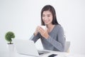 New generation asians business woman sitting and drinking coffee