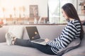 New generation asians business woman using laptop at coffee shop Royalty Free Stock Photo