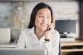 New generation asians business woman using laptop at office,Asian women sitting smiling while working on mobile office concept