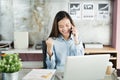 New generation business woman using smartphone,Asian woman are happily working in the office,Working Successful Concept Royalty Free Stock Photo