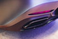 New generation of sportive mufflers. Oval Car Exhaust Tailpipe chromed made of stainless steel on powerful sport car