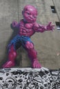 New giant pink Temper Tot mural by Ron English in Little Italy in Manhattan.