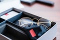 New glasses in present box at optician store Royalty Free Stock Photo