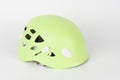 New green climbing helmet on white background Royalty Free Stock Photo