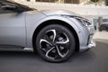 new grey electric crossover Kia EV6 GT in showroom, South Korean automobile company, latest technologies in automotive industry,