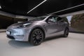 new grey electric tesla model y performance quicksilver, automotive industry, crossover SUV produced by Tesla, EV in Europe,