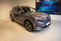 new grey Vinfast electric car, crossover in showroom, trends EV in Europe, technological advancements in automotive industry,