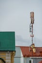 New GSM antennas on the roof of a residential building in the city for transmitting a 5g signal are a danger to human health.