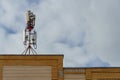 New GSM antennas on the roof of a residential building in the city for transmitting a 5g signal are a danger to human health.