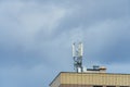 New GSM antennas on the roof of a residential building in the city for transmitting a 5g signal are a danger to human health.