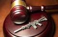 New Gun Regulations - Depicting a Judges gavel with a Weapon Royalty Free Stock Photo